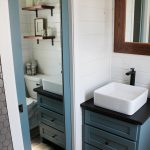 The Harvest Modular or Park Model - Mustard Seed Tiny Homes - bath, mirrored pocket door and tiled shower